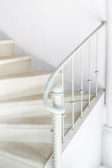 White stairs with vintage white railing