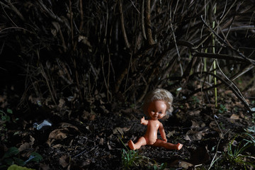 Scary doll. Child abuse. Crime scene