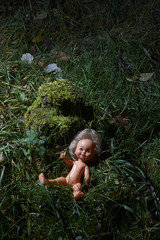 Scary doll. Child abuse. Crime scene