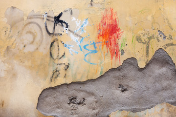 Graffiti on rough vintage wall