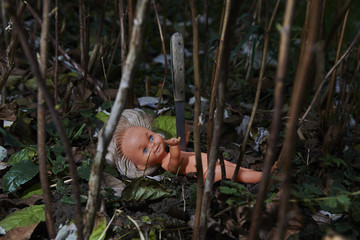 Scary doll. Child abuse. Crime scene