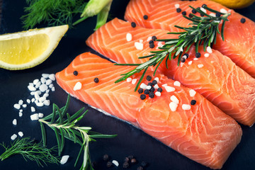 Salmon filet sliced on three parts  with lime.