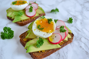 toast with avocado, radish and egg