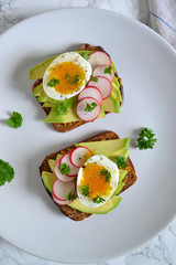 toast with avocado, radish and egg