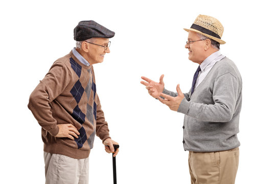 Two Senior Gentlemen Talking To Each Other