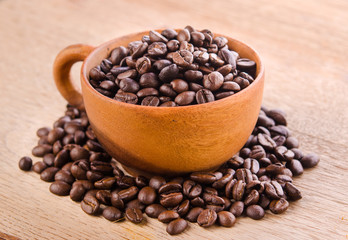 coffee bean in wood cup
