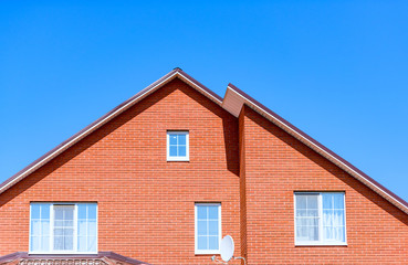 house with a gable roof window