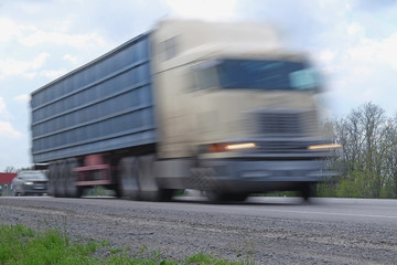 Russia, Krasnodar Region - April, 30, 2016: Cargo transport on the highway in Krasnodar Region, Russia