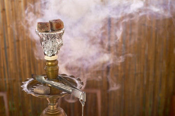 Arabia hookah with charcoal.