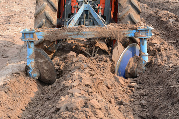 Create a cassava field for tractors.