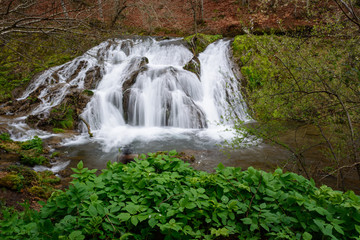 Fototapeta premium View of a river with an beautiful waterfall in the forest, Strandzha mountain, Bulgaria