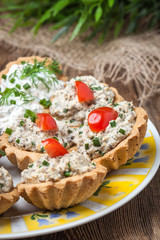 Muffins with smoked salmon pate, cheese and dill.