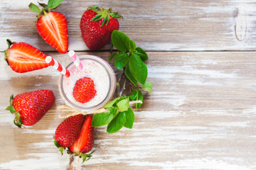 Strawberry smoothie in glass jar