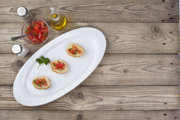 bruschetta slices with condiments