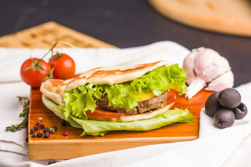 gourmet homemade burger with garnish
