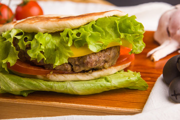 gourmet homemade burger with garnish