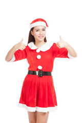 Asian Christmas girl with Santa Claus clothes show thumbs up