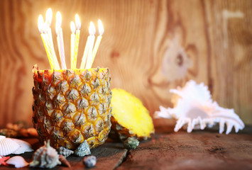 pineapple fruit with birthday candles