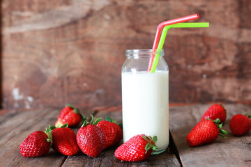 strawberries and milk in a glass