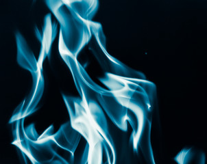 blue flame fire on a black background