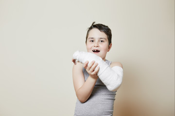 cute boy with broken arm