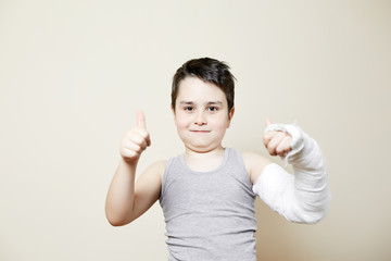 cute boy with broken arm