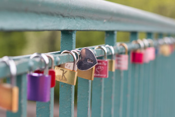 heart shaped padlock on bridge