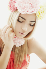 beautiful girl with wreath of flowers
