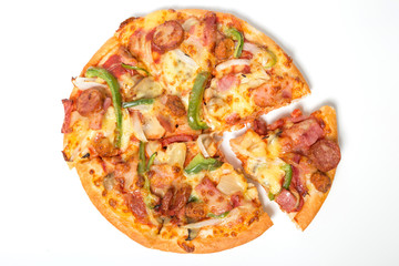Pizza with sliced vegetables isolated on white