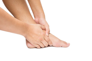 Acute pain in foot. hand massage foot isolated white