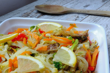 Escabeche: typical mediterranean cuisine, with fried fish and vegetables in an acidic mixture 