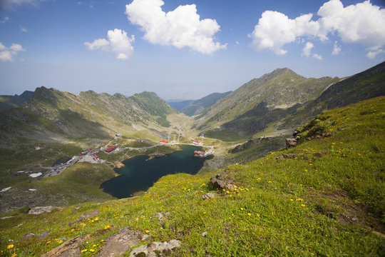 High mountain landscape with glacier lake in the Carpathian Mountains in Romania, Fogaras