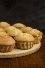 Homemade sweet banana muffins on the wooden table
