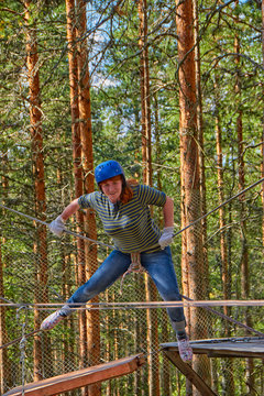 Girl in a Forest Rope Park Challenge