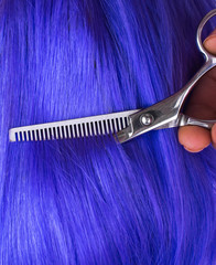 Hairdressing Scissors in hand at the hairdresser.