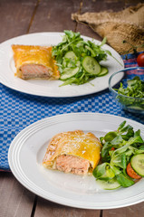 Salmon baked in puff pastry