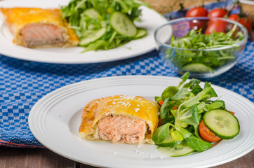 Salmon baked in puff pastry