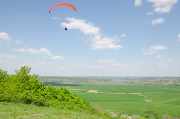 Paragliding in the valley at mountain Karatchoun