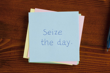 Seize the day handwritten on a note