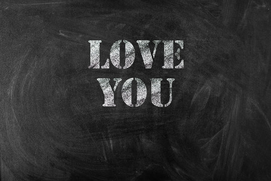 black chalk board with text love you