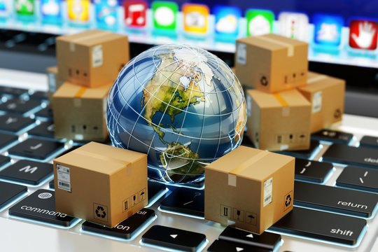 Internet shopping, online purchases, e-commerce, international package delivery concept, global transportation business, stack of cardboard boxes and Earth globe on computer keyboard