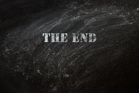 black chalk board with text the end