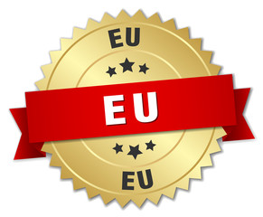 eu round golden badge with red ribbon