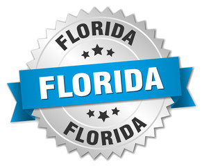Florida round silver badge with blue ribbon