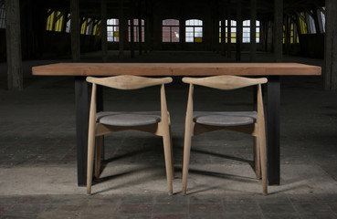 modern wooden table in the loft interior 