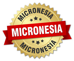 Micronesia round golden badge with red ribbon