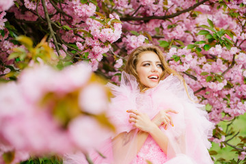 Happy woman in blossom