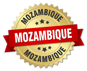 Mozambique round golden badge with red ribbon