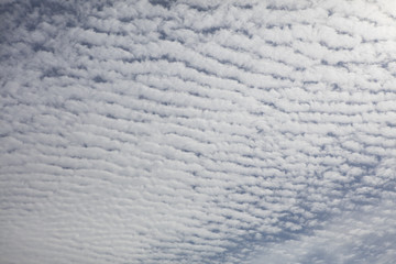 cloud patterns in front of blue sky, Sitges, Spain