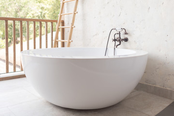 bathtub with vintage style faucet